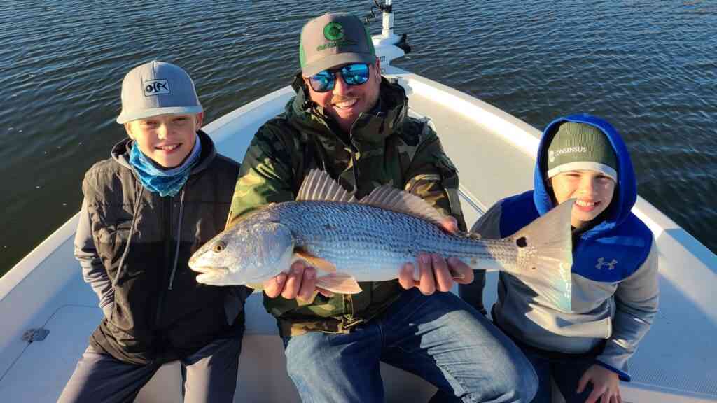 anglers with redfish