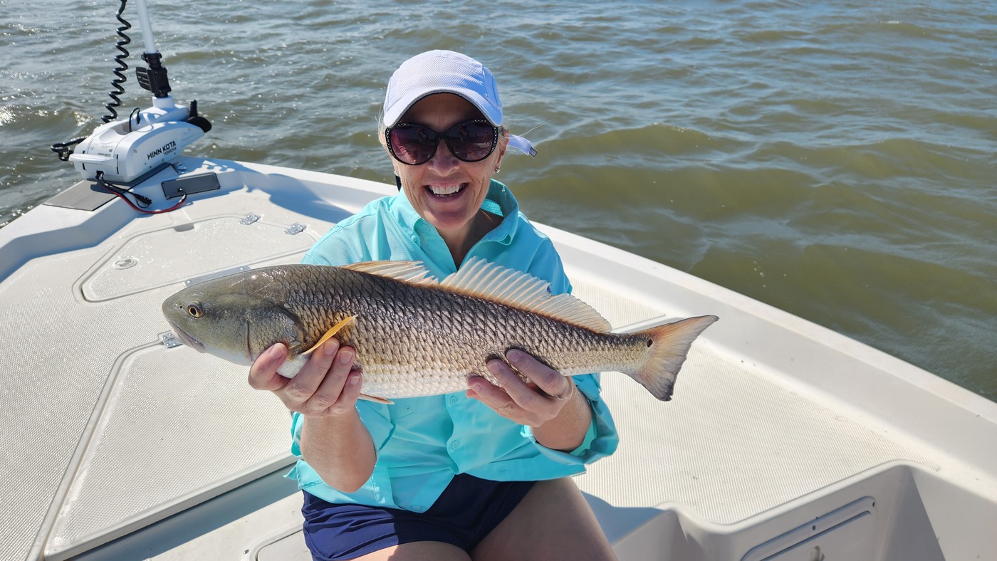 woman with redfish