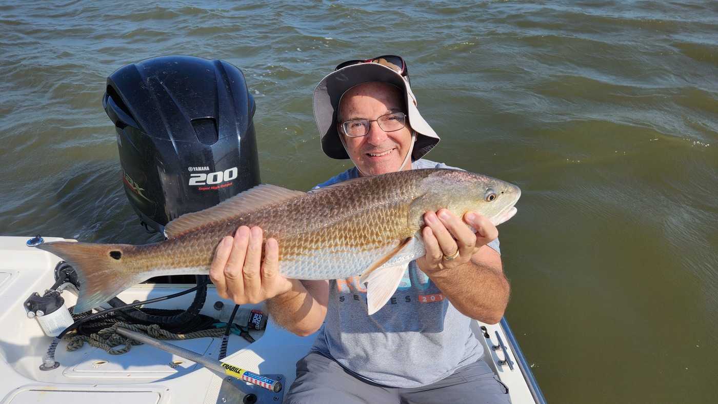 a picture of Topwater Fishing for Fall Seatrout and Redfish with Harvest Moon Fishing Charters
