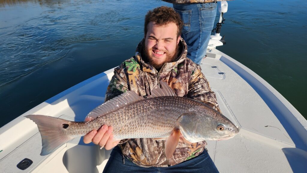 person with redfish