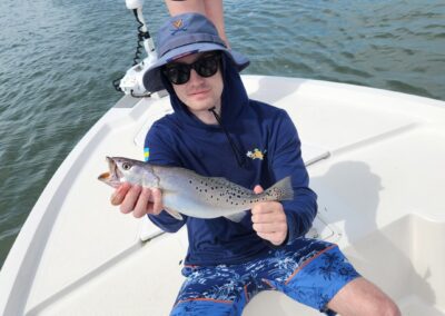man holding sea trout
