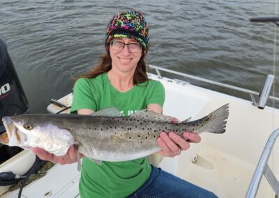 woman with speckled trout