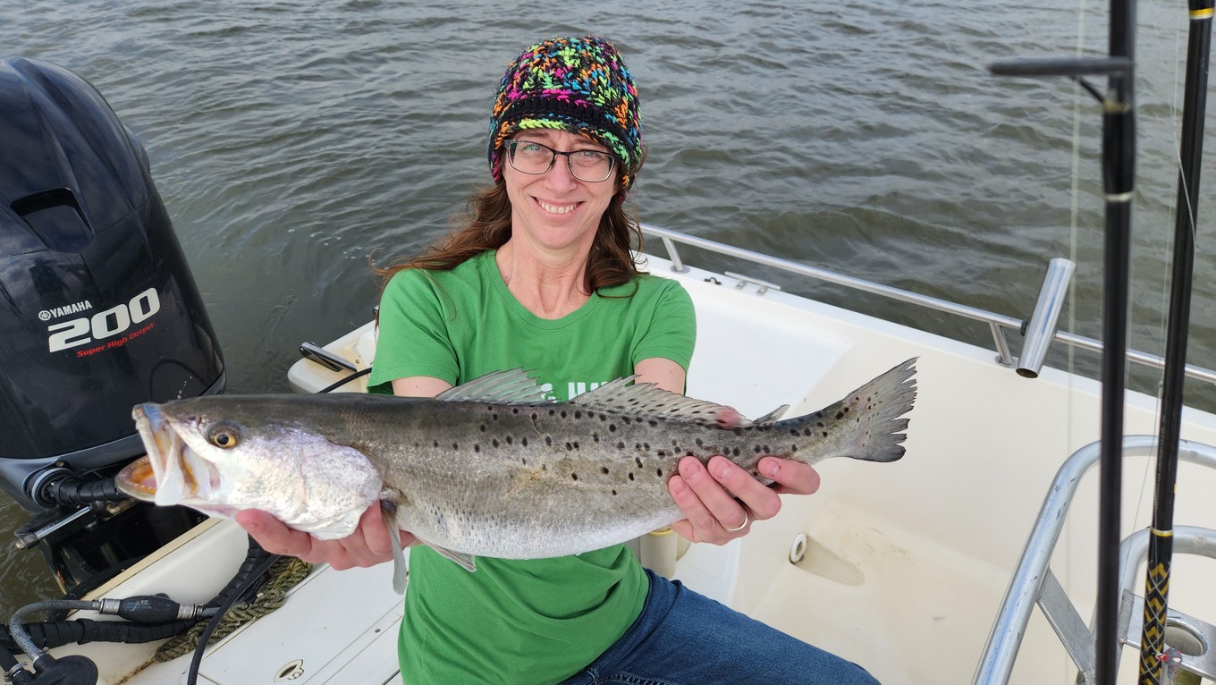 woman with speckled trout